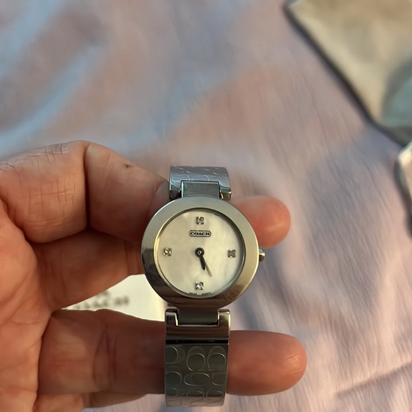 Coach brand stainless steel watch with 4 diamonds on the watch face EUC. - Picture 2 of 5